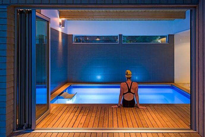 Pool Rectangle with decking and blue white walls