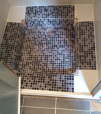 Shower tray part tiled